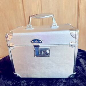Small silver trunk style purse